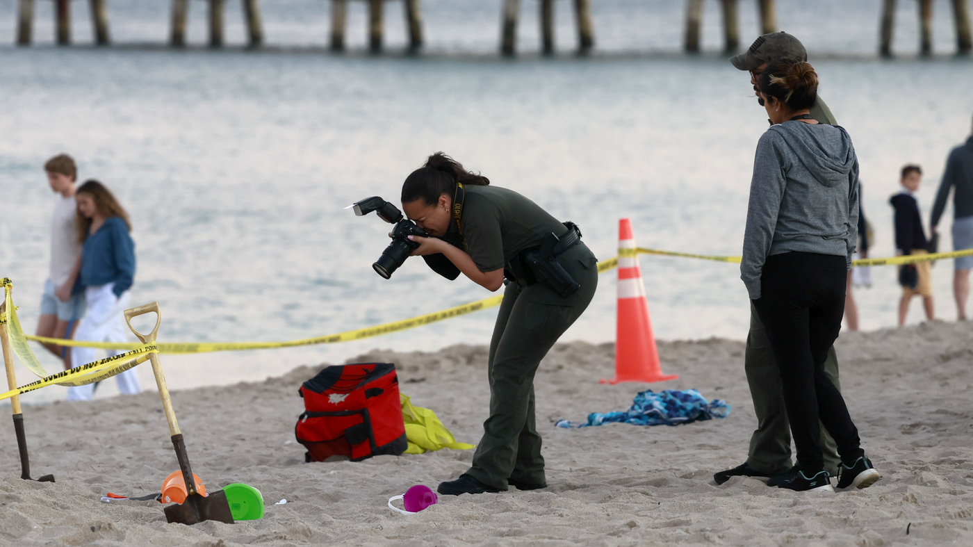 A girl dies after a sand hole on a Florida beach collapses : NPR