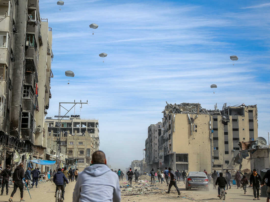 Airdropping aid is inefficient — so why is the U.S. doing it in Gaza anyway? : NPR
